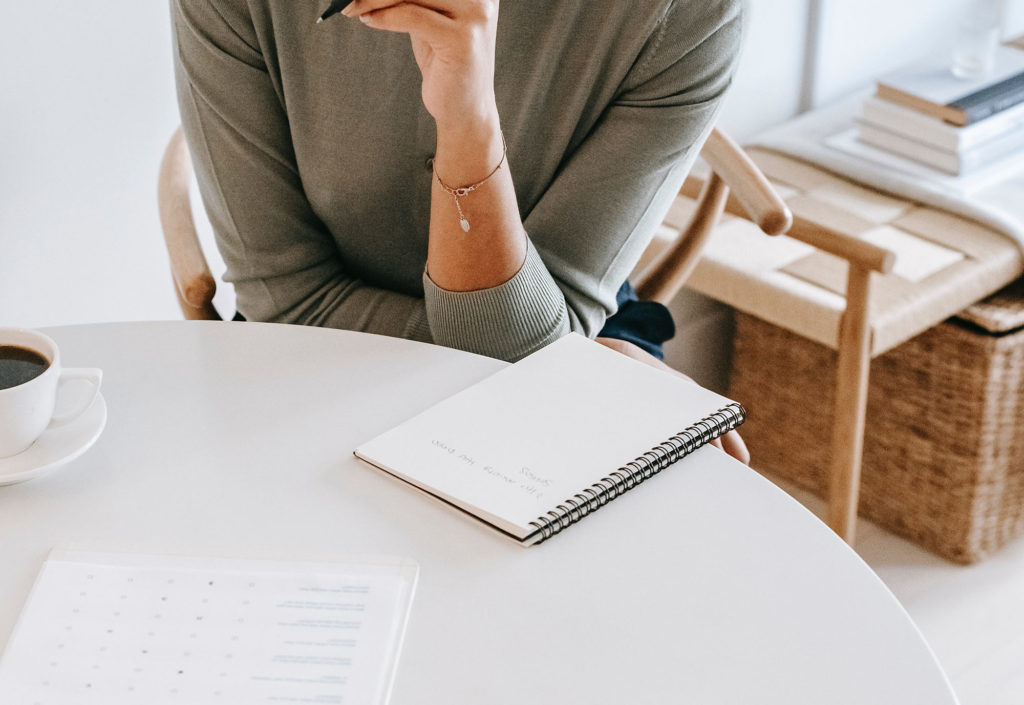 Child and adult psychiatrist taking notes.